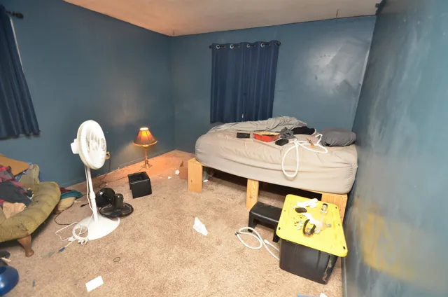 a bed room with a bed