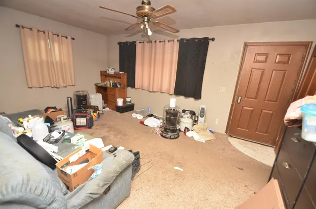 a view of a workspace with furniture