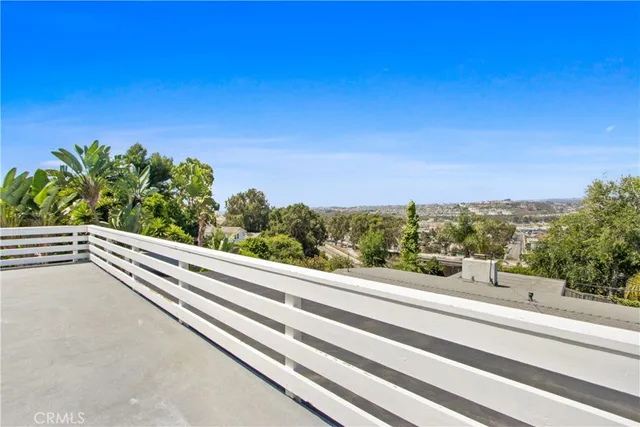 a view of a building from a balcony