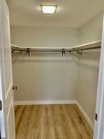 a view of a room with racks on the wall