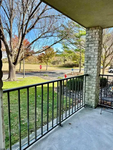 a view of a balcony with an outdoor space