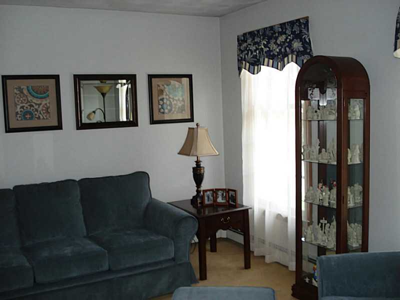 74 Scarborough Road Cumberland, RI 02864 - Photo 16 of 20 Living Room. LIving Room which leads into the Family Room giving ample space for entertaining.