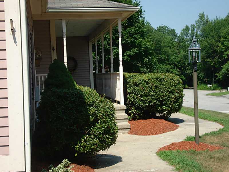 74 Scarborough Road Cumberland, RI 02864 - Photo 2 of 20 Exterior Front. Side Entrance