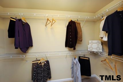 2430 Pecan Ridge Way Apex, NC 27502 - Photo 19 of 23 Large walk-in closet! Not actual home - photo is of model home.