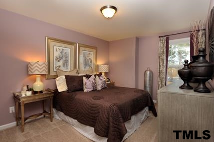 2430 Pecan Ridge Way Apex, NC 27502 - Photo 21 of 23 The secondary bedrooms are great sizes!! Not actual home - photo is of model home.