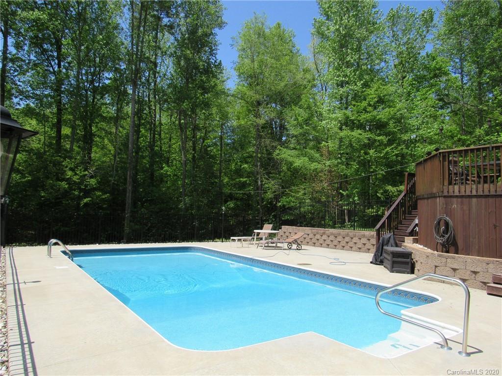 405 Front Ridge Circle, Unit 62 Rutherfordton, NC 28139 - Photo 1 of 30 a view of a swimming pool with a patio