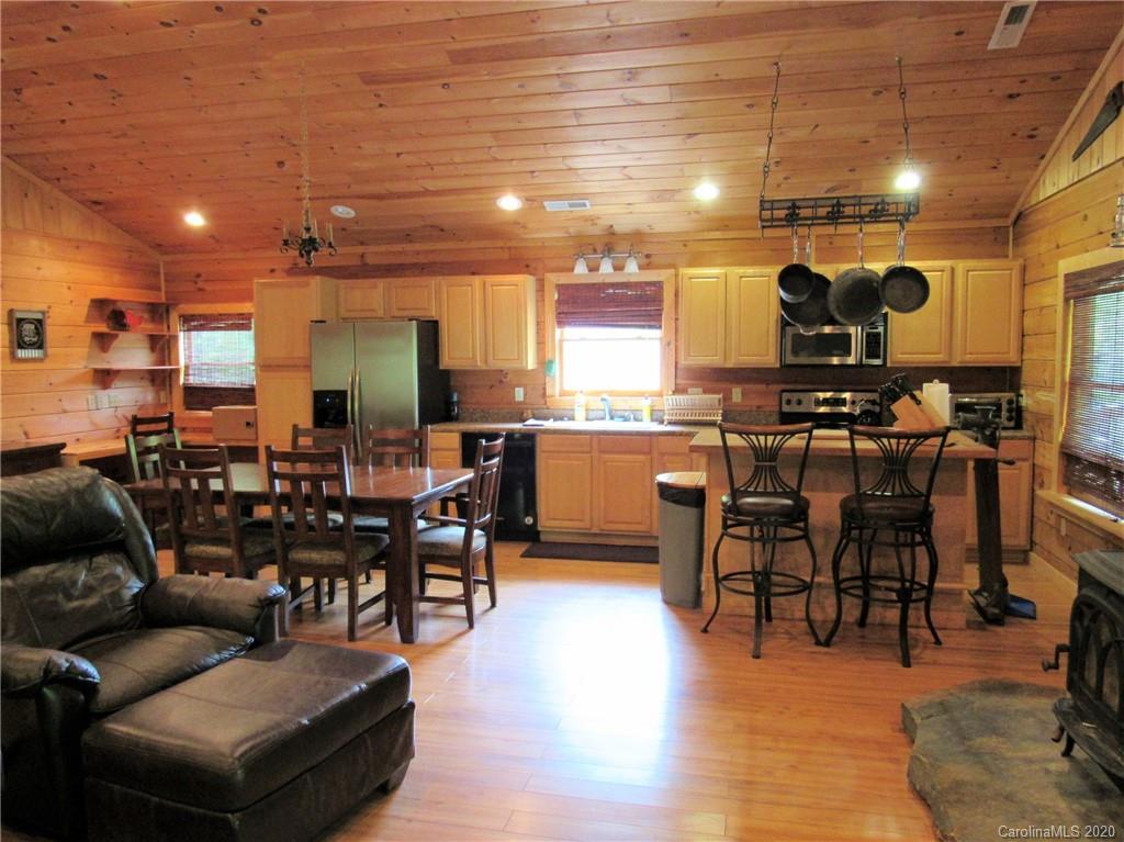405 Front Ridge Circle, Unit 62 Rutherfordton, NC 28139 - Photo 11 of 30 a view of a dining room with furniture