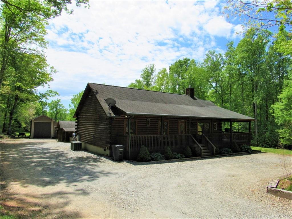 405 Front Ridge Circle, Unit 62 Rutherfordton, NC 28139 - Photo 22 of 30 a front view of a house with a yard