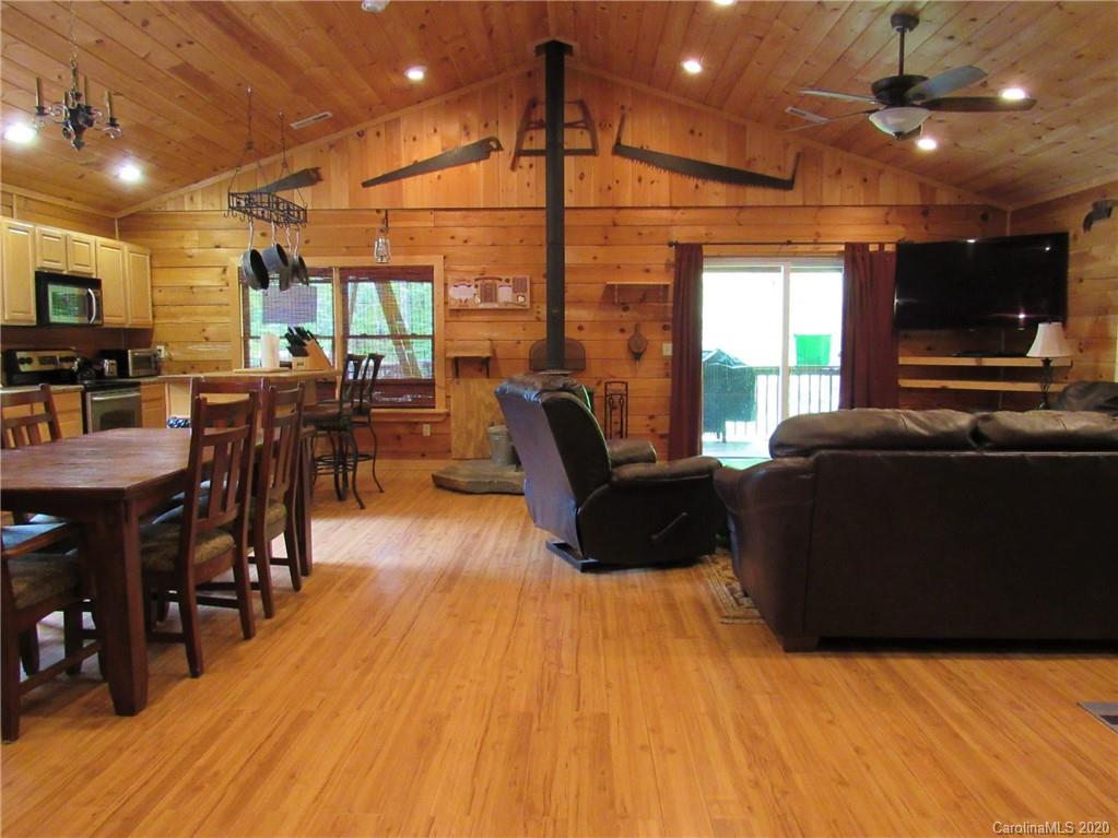 405 Front Ridge Circle, Unit 62 Rutherfordton, NC 28139 - Photo 9 of 30 a living room with lots of furniture and a flat screen tv