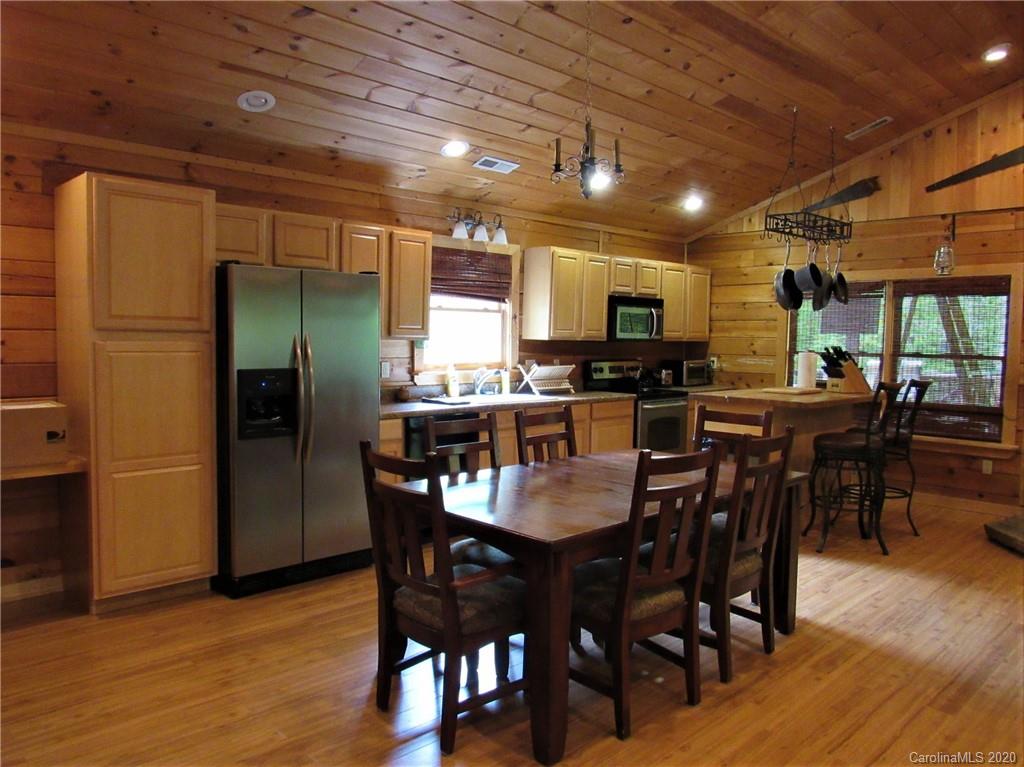 405 Front Ridge Circle, Unit 62 Rutherfordton, NC 28139 - Photo 10 of 30 a view of a dining room with furniture