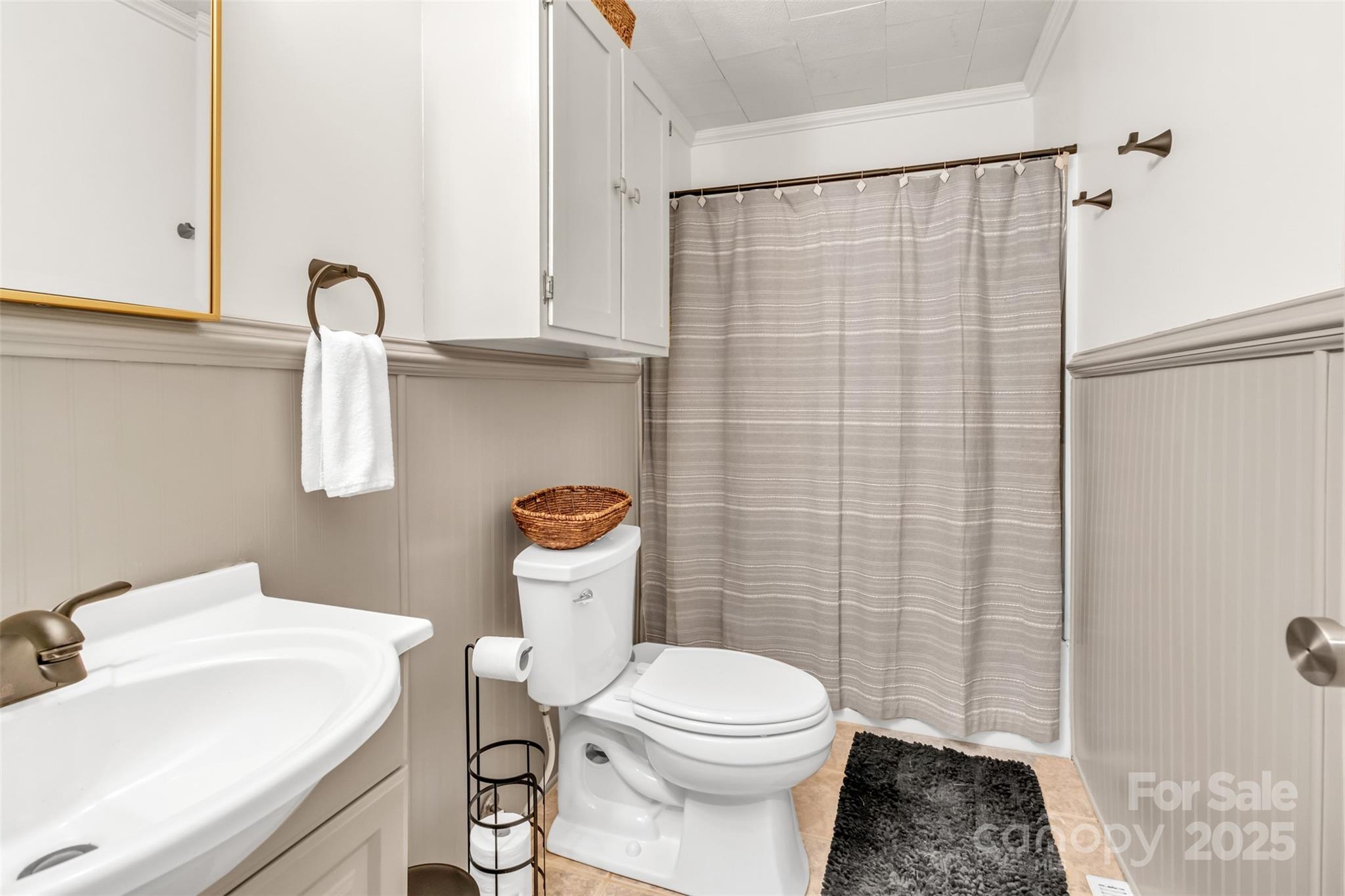 113 Marion Street Clover, SC 29710 - Photo 13 of 26 a bathroom with a sink a toilet and shower