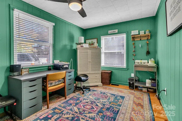 a room with furniture and a rug