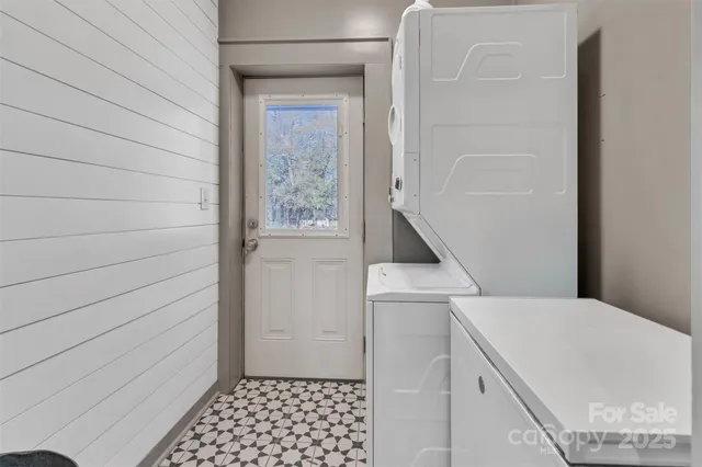 a bathroom with a sink and vanity