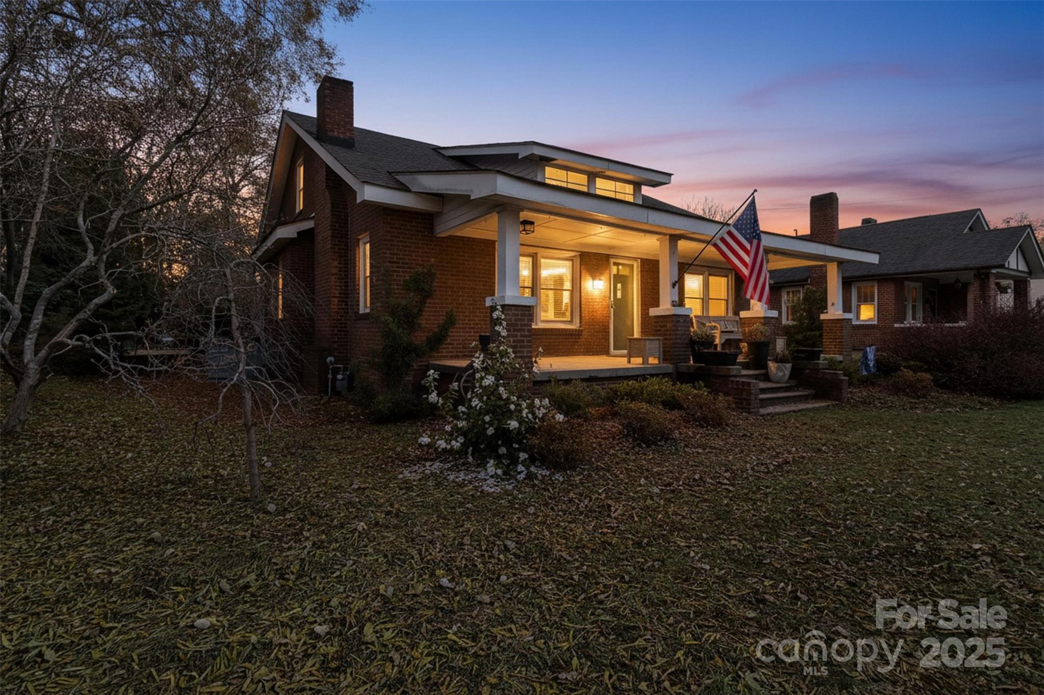 113 Marion Street Clover, SC 29710 - Photo 2 of 26 a front view of a house with a yard