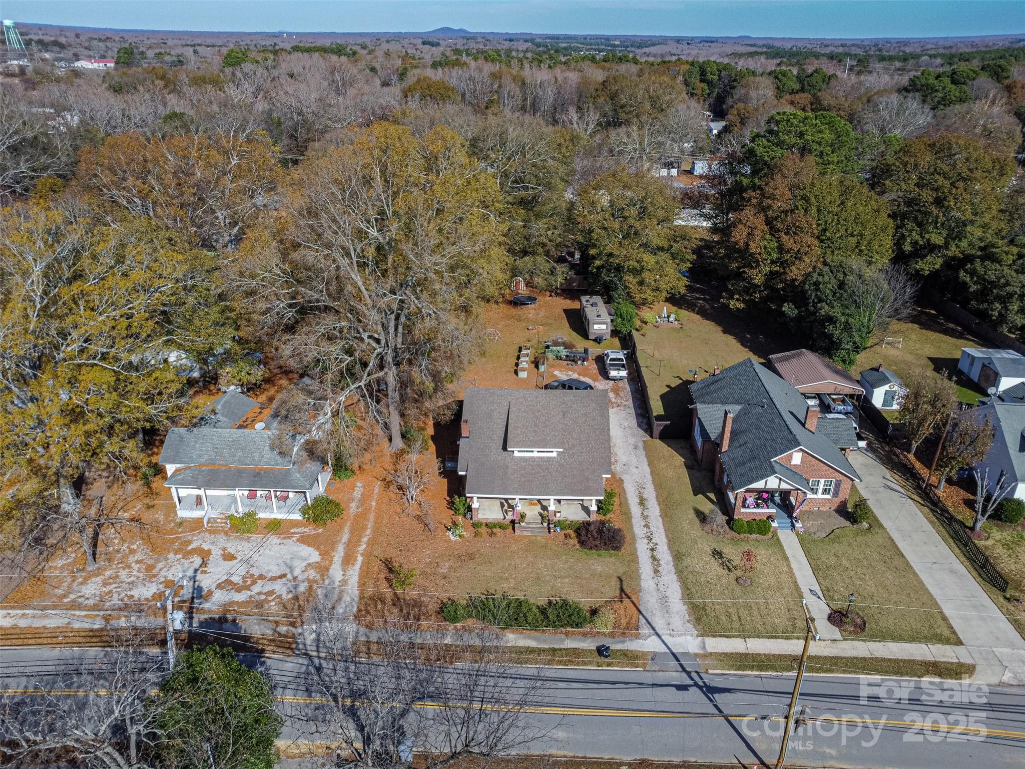 113 Marion Street Clover, SC 29710 - Photo 23 of 26 an aerial view of a house with a swimming pool