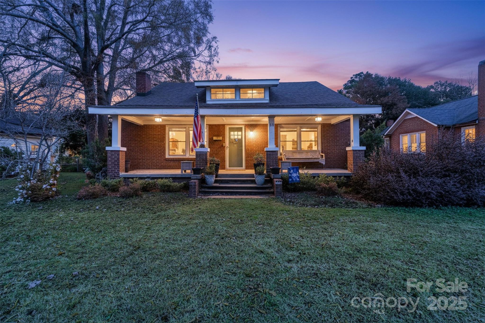 113 Marion Street Clover, SC 29710 - Photo 3 of 26 a view of a house with garden and porch