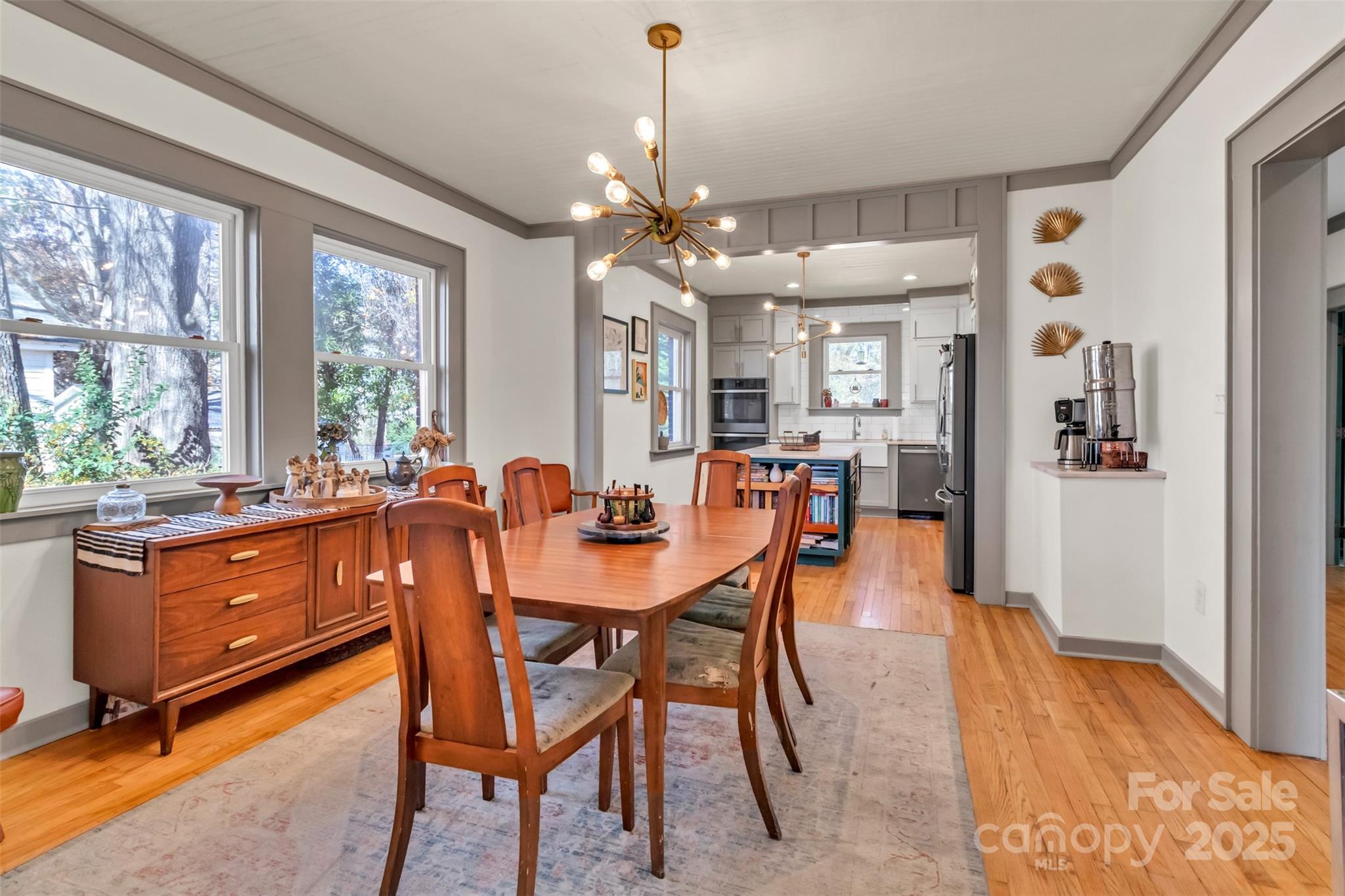 113 Marion Street Clover, SC 29710 - Photo 8 of 26 a view of a dining room with furniture window and wooden floor