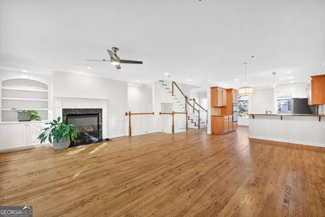 a view of a kitchen with furniture and a fireplace