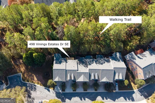 a view of a tables and chairs on the roof deck