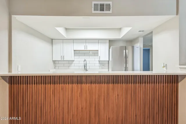 a view of a kitchen from a windows