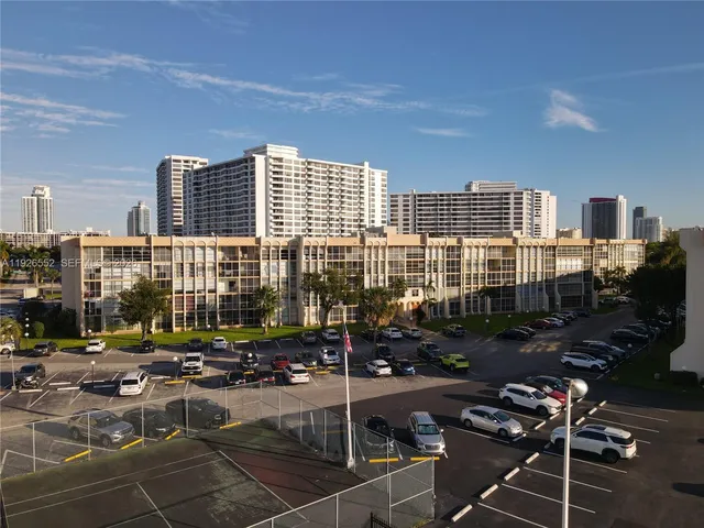 a cars parked in front of a building