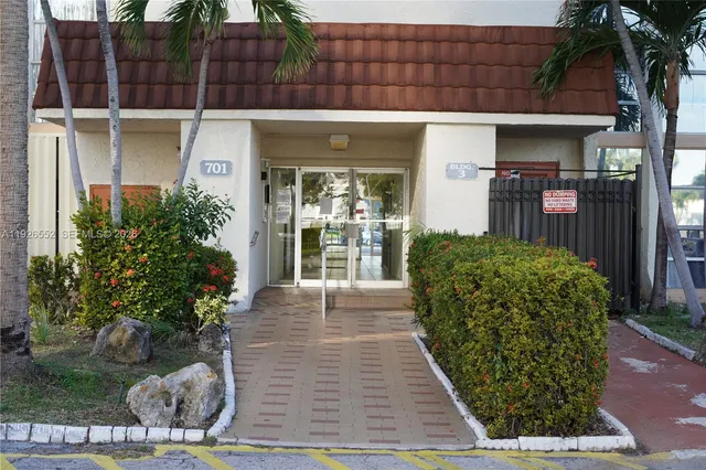 a room with lots of counter space and a large window