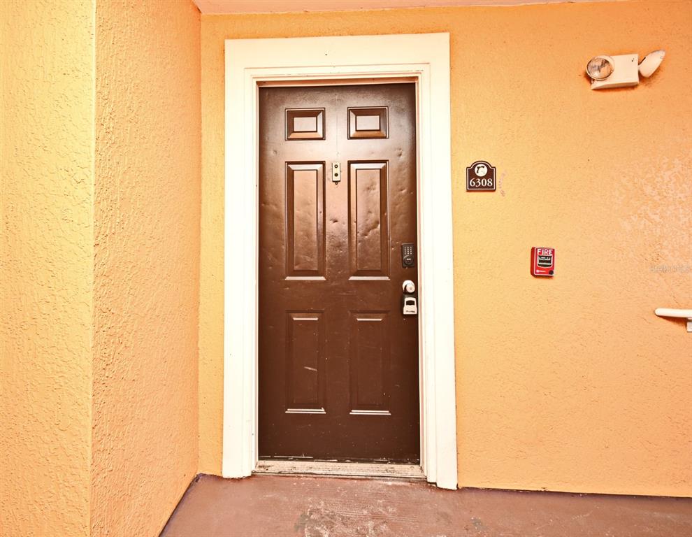 5467 Vineland Road, Unit 6308 Orlando, FL 32811 - Photo 32 of 36 a view of a bathroom with a shower