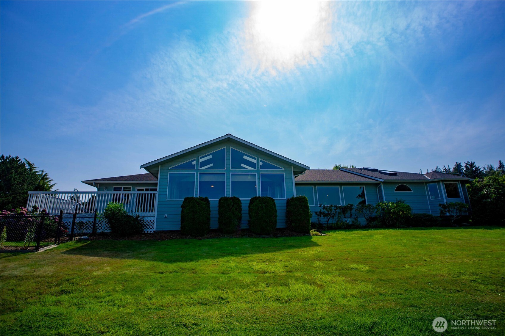 71 Le Roux Road Sequim, WA 98382 - Photo 1 of 40 a front view of a house with garden