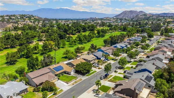 an aerial view of a house with a garden
