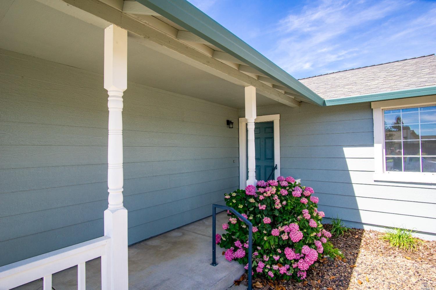 2072 Canover Court Santa Rosa, CA 95403 - Photo 1 of 1 a flowers house in front of a door