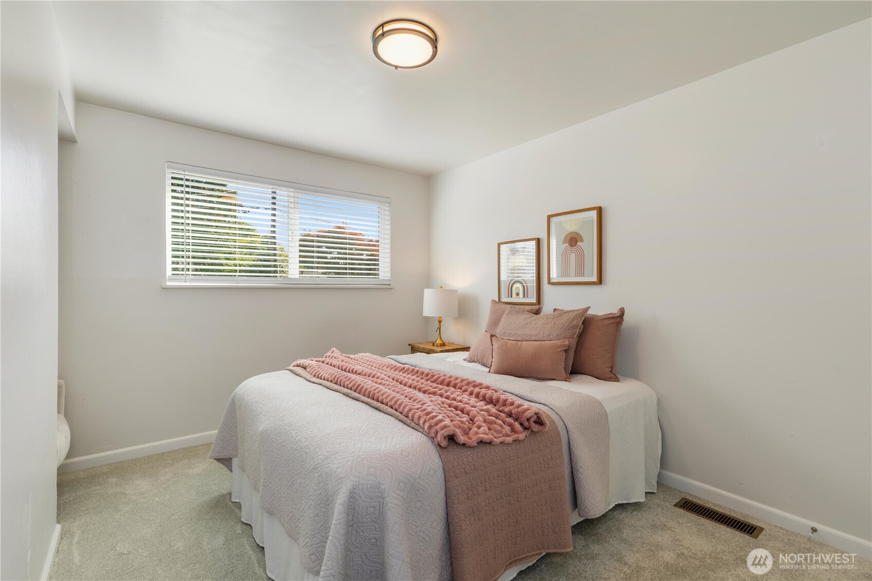 8423 198th Street Southwest Edmonds, WA 98026 - Photo 16 of 26 a bedroom with a bed and a window