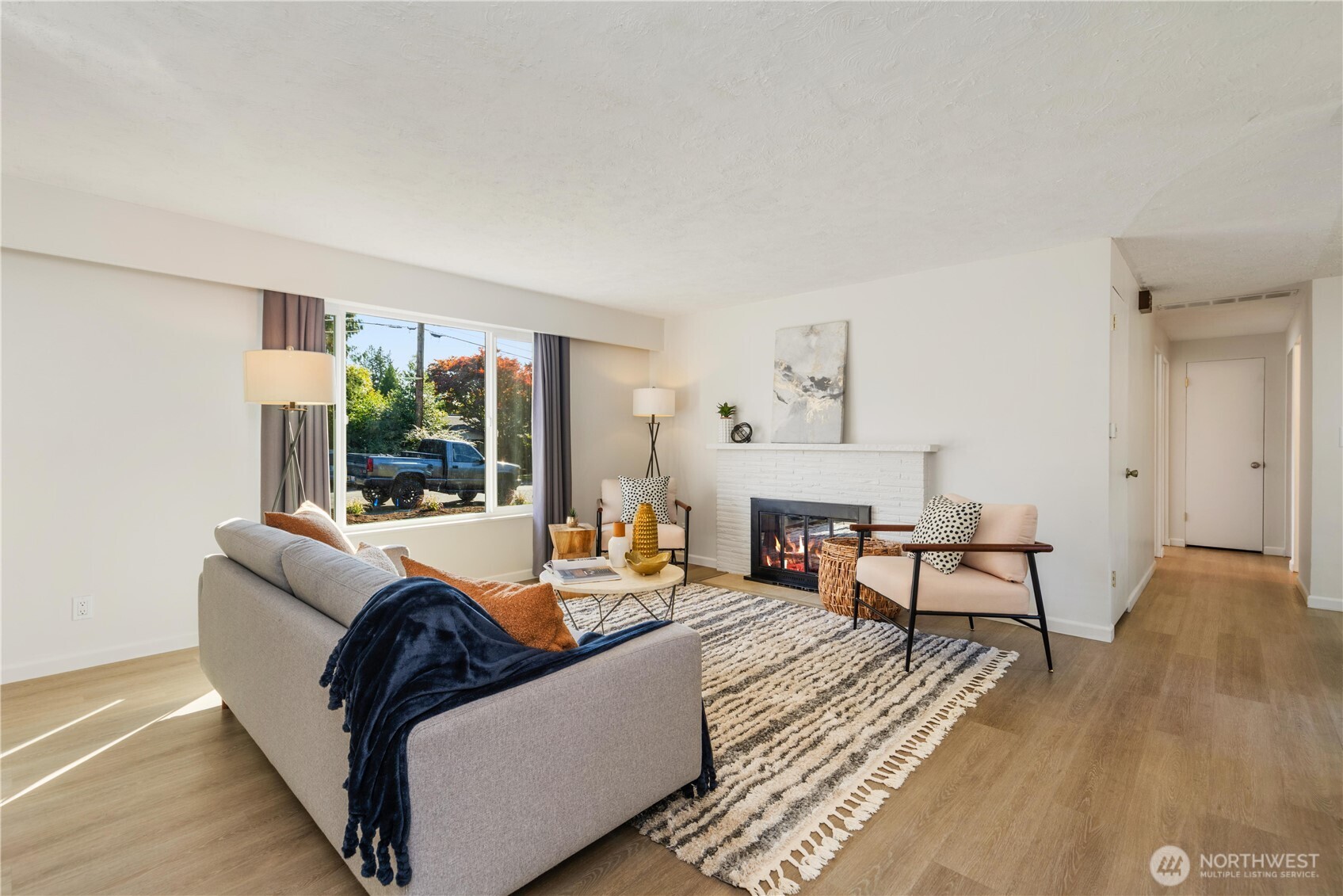 8423 198th Street Southwest Edmonds, WA 98026 - Photo 3 of 26 a living room with furniture and a table