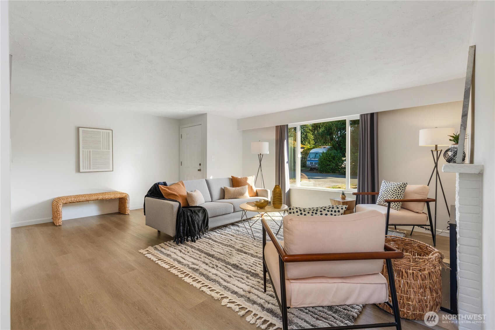8423 198th Street Southwest Edmonds, WA 98026 - Photo 5 of 26 a living room with furniture a large window and a table