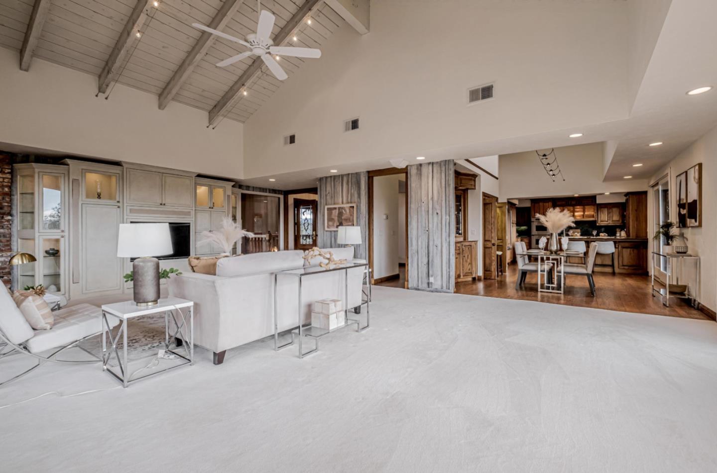 17070 Lon Road Los Gatos, CA 95033 - Photo 11 of 56 a living room with furniture and a large window