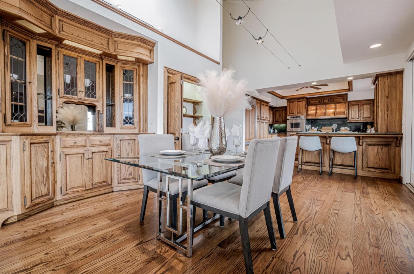 17070 Lon Road Los Gatos, CA 95033 - Photo 14 of 56 a view of a dining room with furniture and wooden floor