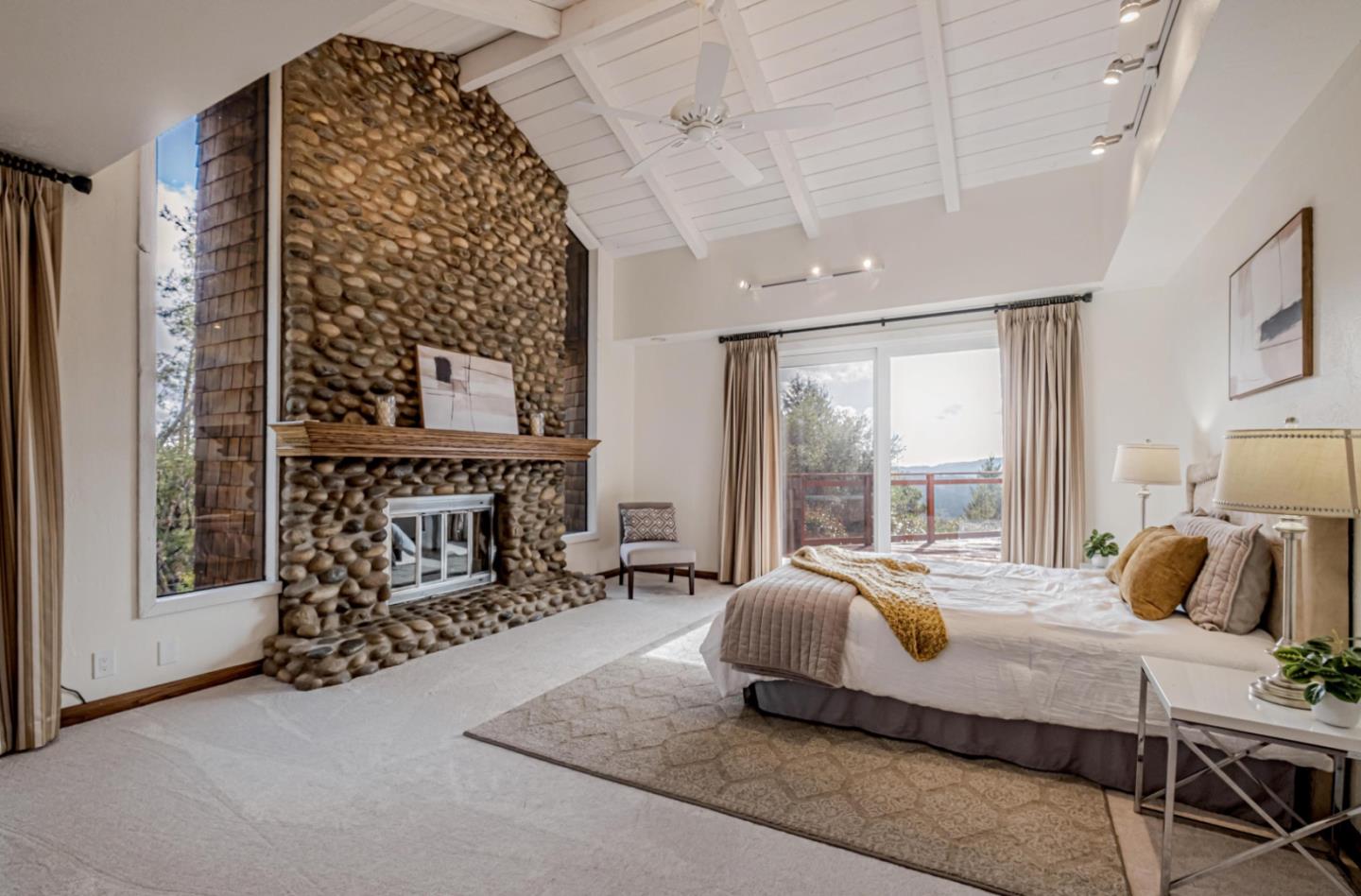 17070 Lon Road Los Gatos, CA 95033 - Photo 22 of 56 a bedroom with a bed and wooden floor