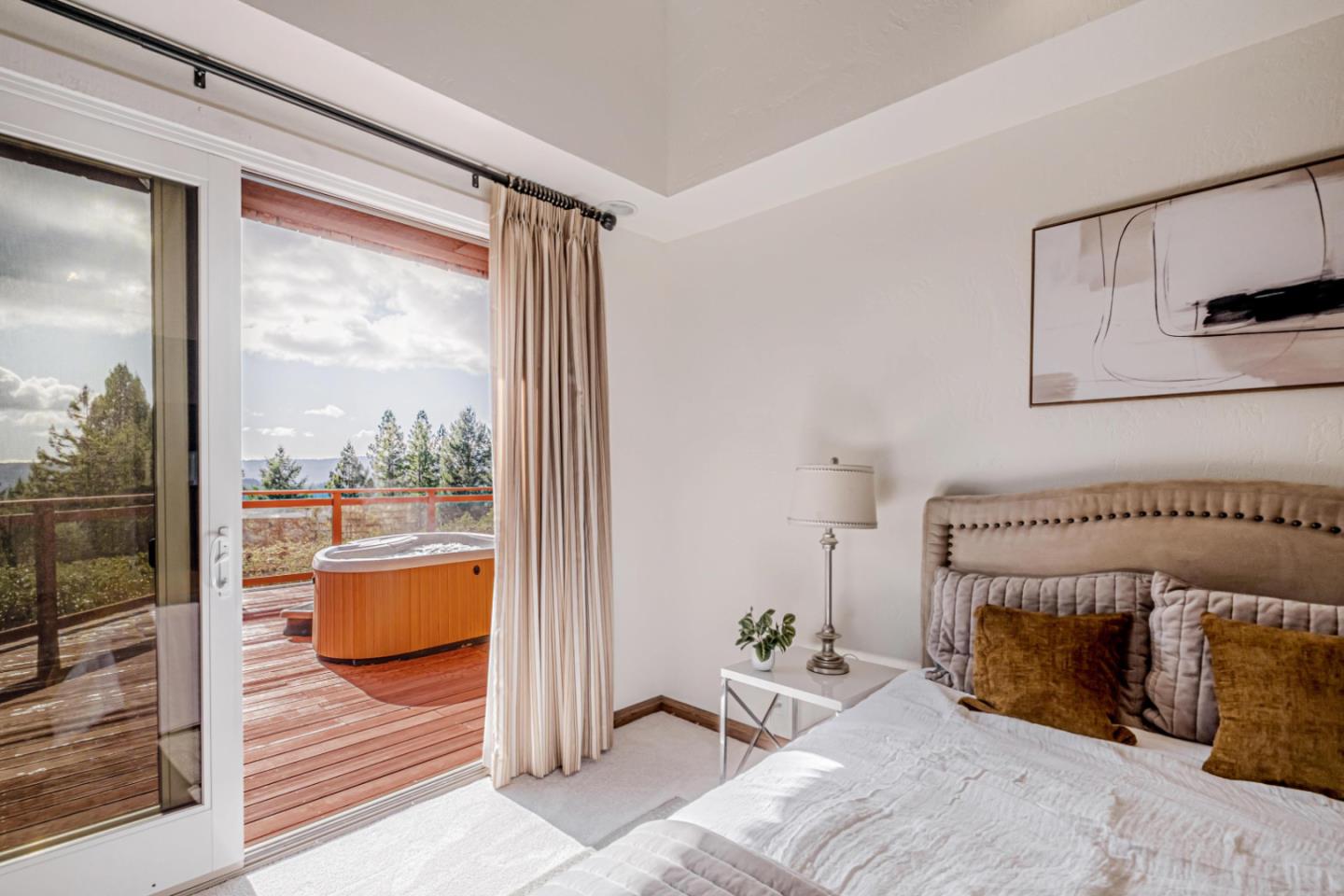 17070 Lon Road Los Gatos, CA 95033 - Photo 23 of 56 a bedroom with a bed and a window