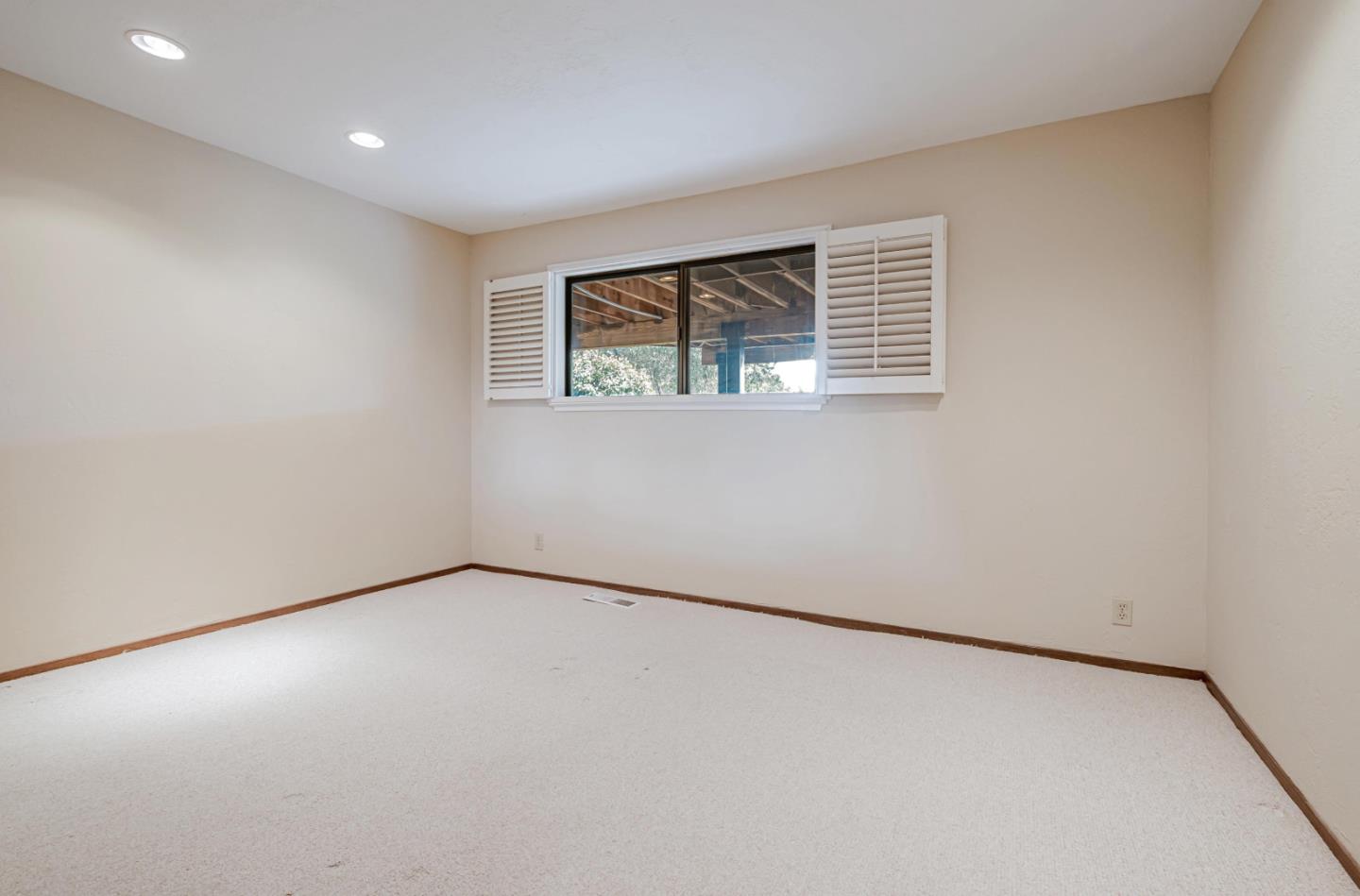 17070 Lon Road Los Gatos, CA 95033 - Photo 30 of 56 an empty room with a window