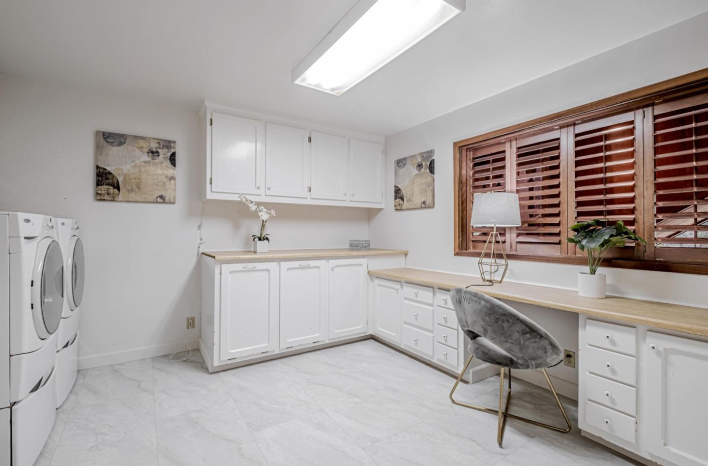 17070 Lon Road Los Gatos, CA 95033 - Photo 37 of 56 a kitchen with white cabinets and sink