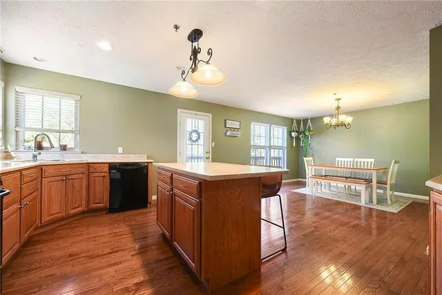 a kitchen with a wooden cabinets and counter space