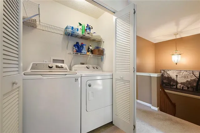 a utility room with washer and dryer