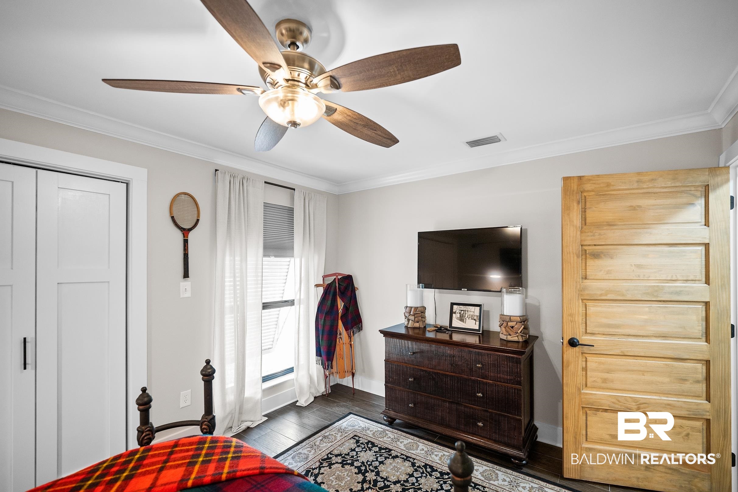 8490 Bay View Drive Foley, AL 36535 - Photo 36 of 67 Bedroom with crown molding, ceiling fan, and wood finished floors