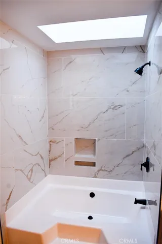 a bathroom with a bathtub