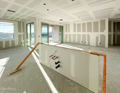 a swimming pool with outdoor seating