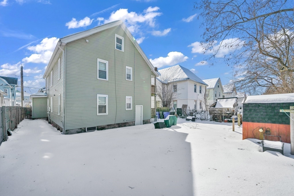 100-102 Wait Street Springfield, MA 01104 - Photo 34 of 35 a view of a house with a patio