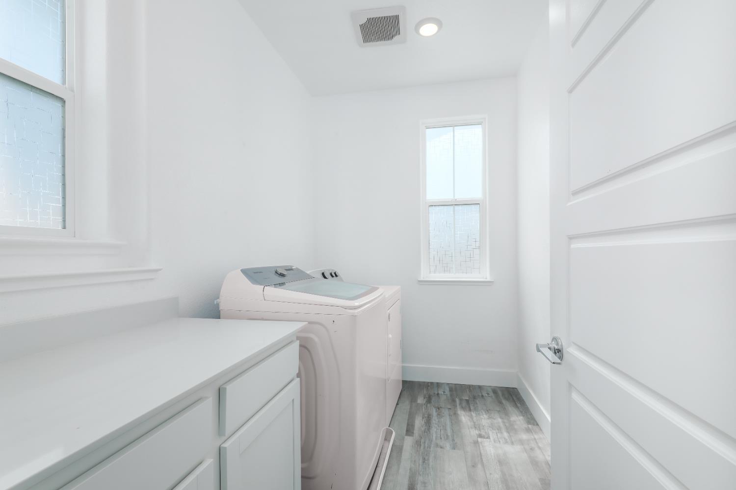 650 Nathaniel Avenue Galt, CA 95632 - Photo 24 of 46 a view of utility room with washer and dryer