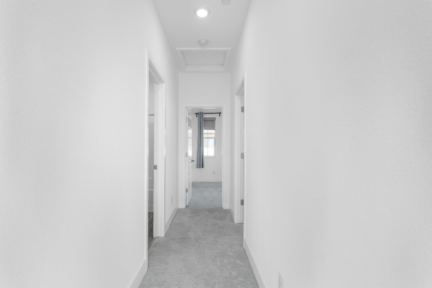 650 Nathaniel Avenue Galt, CA 95632 - Photo 27 of 46 a view of a bathroom from a hallway