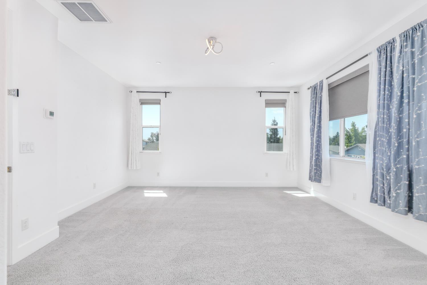 650 Nathaniel Avenue Galt, CA 95632 - Photo 30 of 46 an empty room with windows