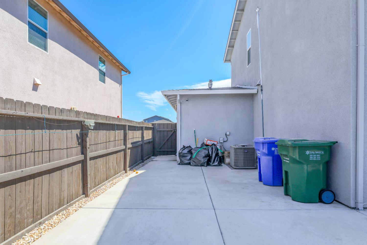 650 Nathaniel Avenue Galt, CA 95632 - Photo 36 of 46 a view of a patio with two chairs and a potted plant