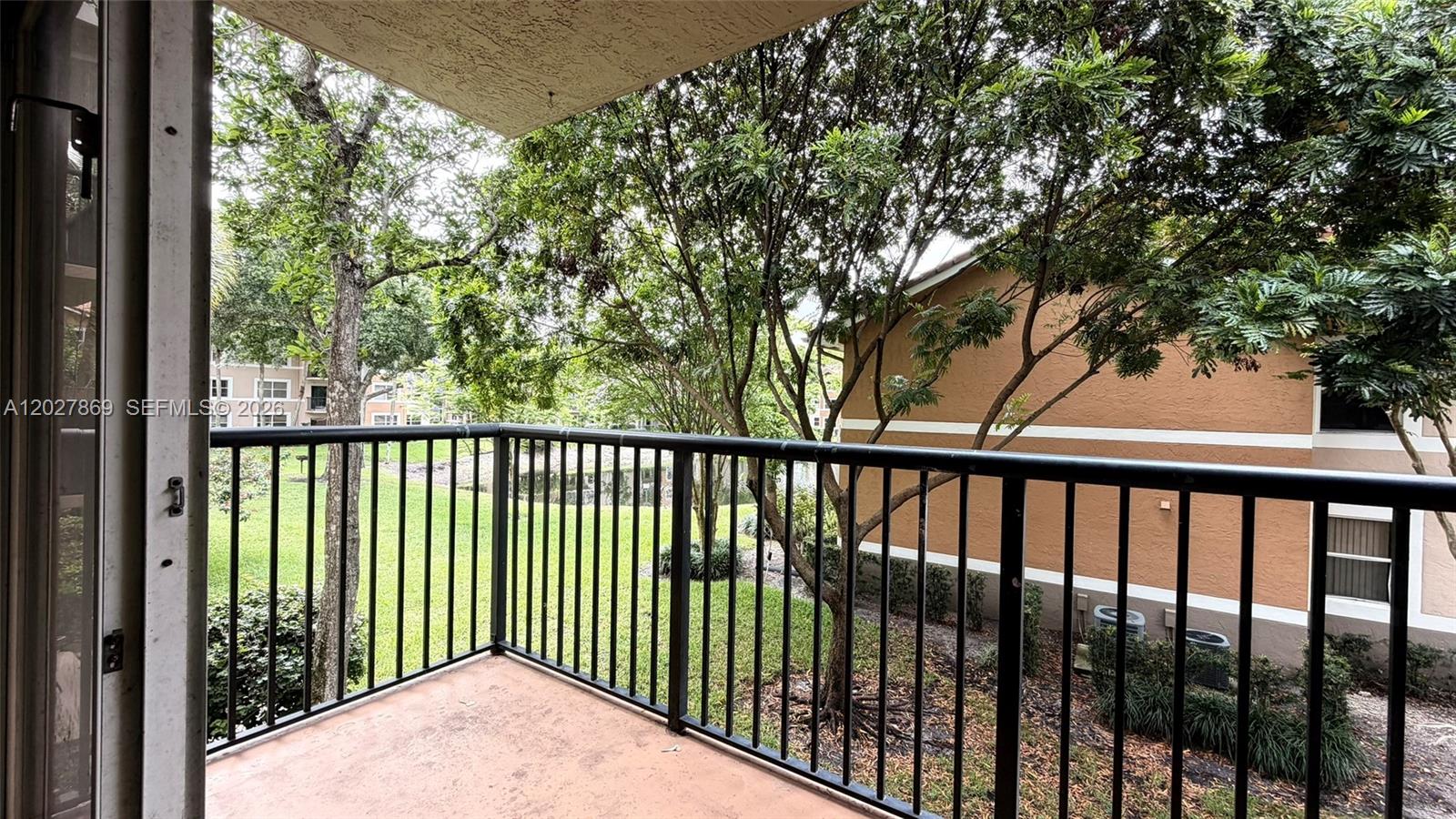 8761 Wiles Road, Unit 206 Coral Springs, FL 33067 - Photo 6 of 26 a view of a balcony